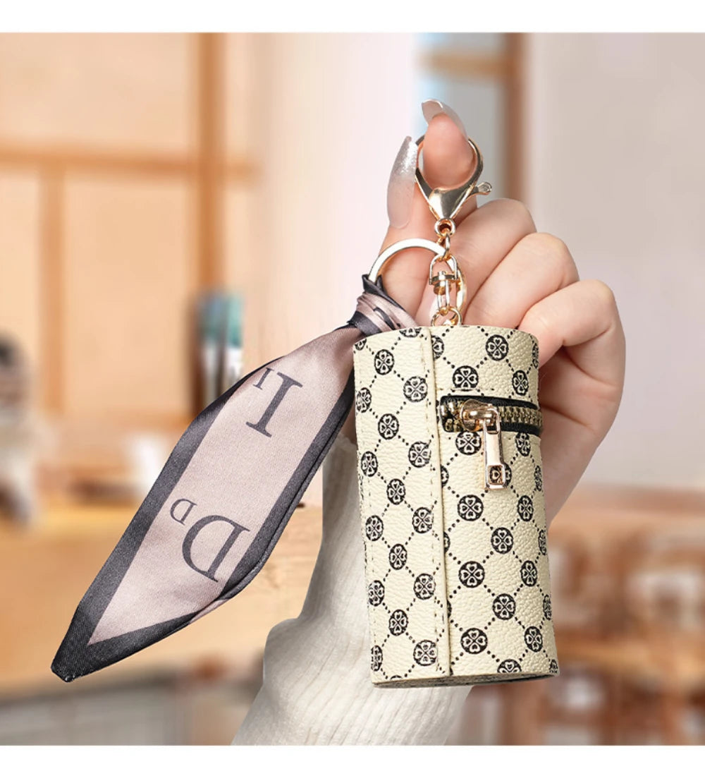 High-end luxury coin purse pendants, earphone cases, lipstick mini keychain bags, retro bucket mouth red envelopes, and simple p