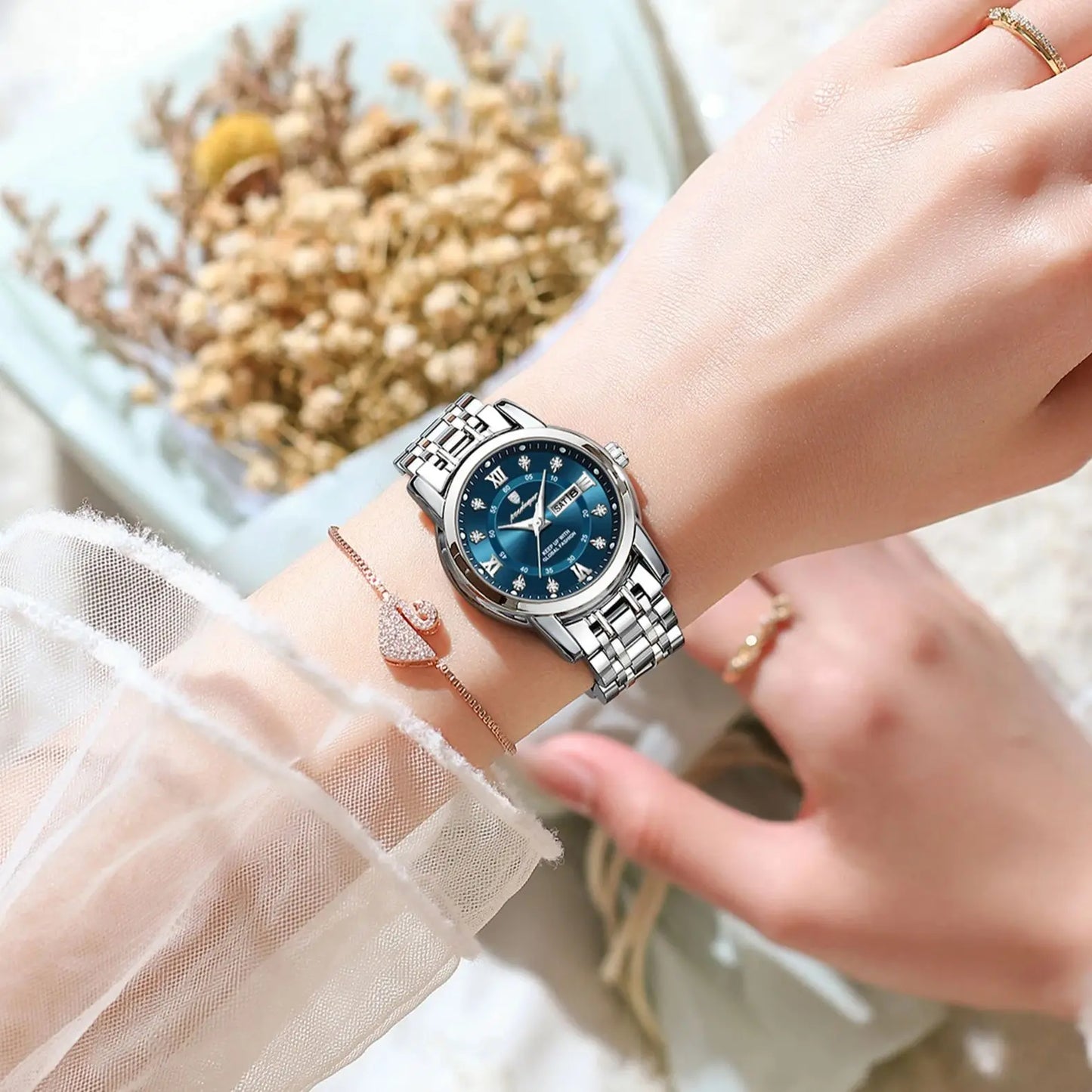 POEDAGAR Luxury Women Wristwatch Waterproof Luminous Date Week Women's Watches Stainless Steel Elegant Dress Quartz Ladies Watch