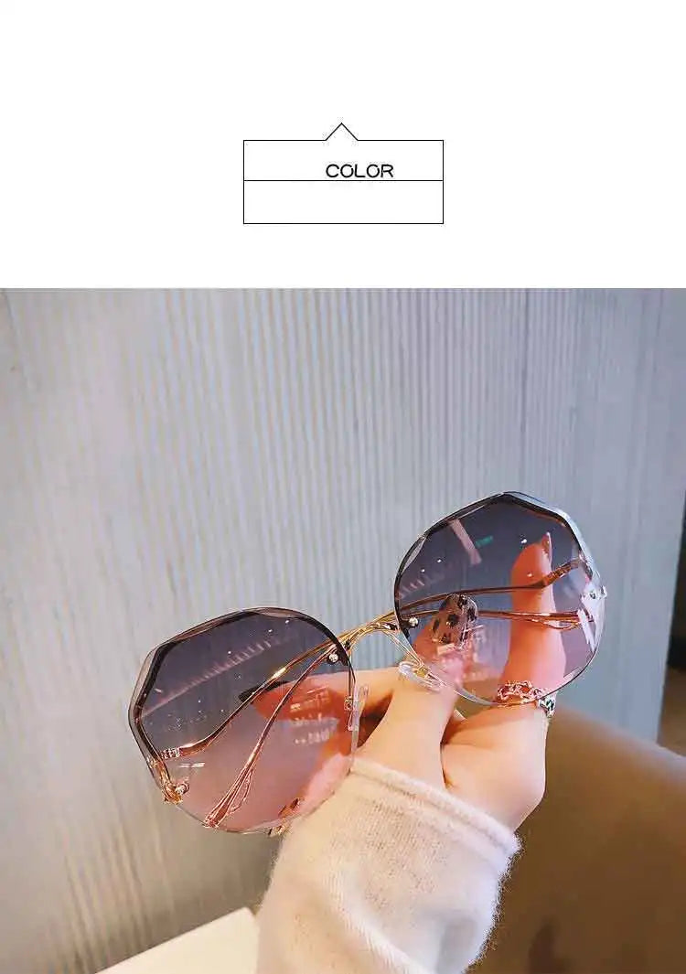Trendy fashionable polygonal frameless cut edge sunglasses women's metal curved legs retro street photo sunglasses
