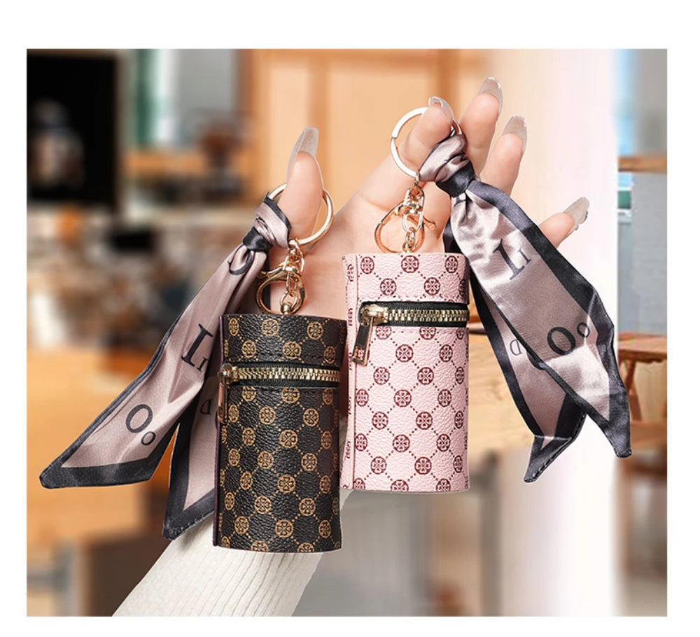 High-end luxury coin purse pendants, earphone cases, lipstick mini keychain bags, retro bucket mouth red envelopes, and simple p