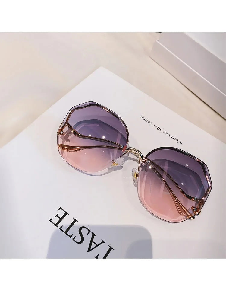 Trendy fashionable polygonal frameless cut edge sunglasses women's metal curved legs retro street photo sunglasses