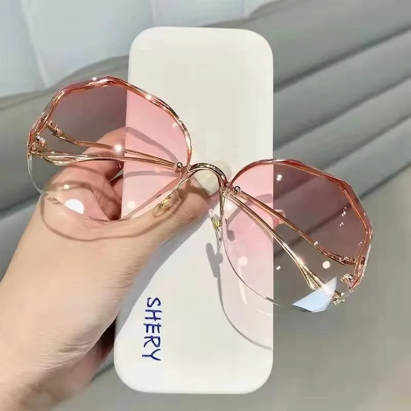 Trendy fashionable polygonal frameless cut edge sunglasses women's metal curved legs retro street photo sunglasses